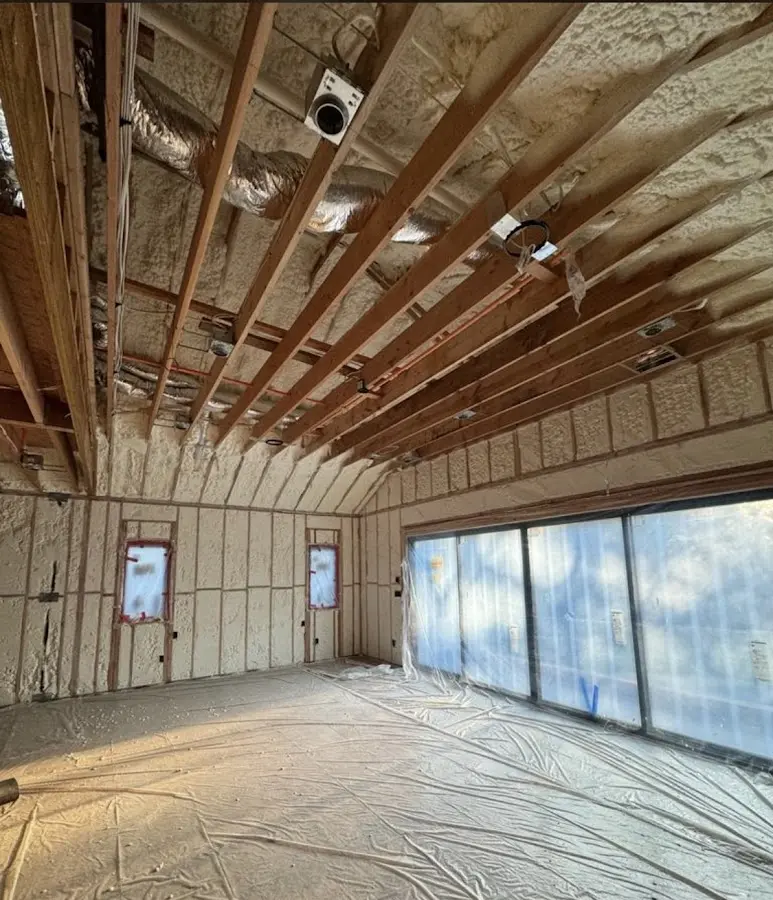 Interior walls and ceiling insulated with spray foam during new construction in Glencoe